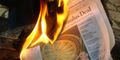 Newspaper-on-fire